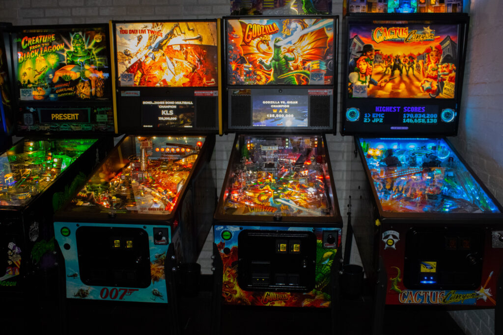 A row of pinball machines