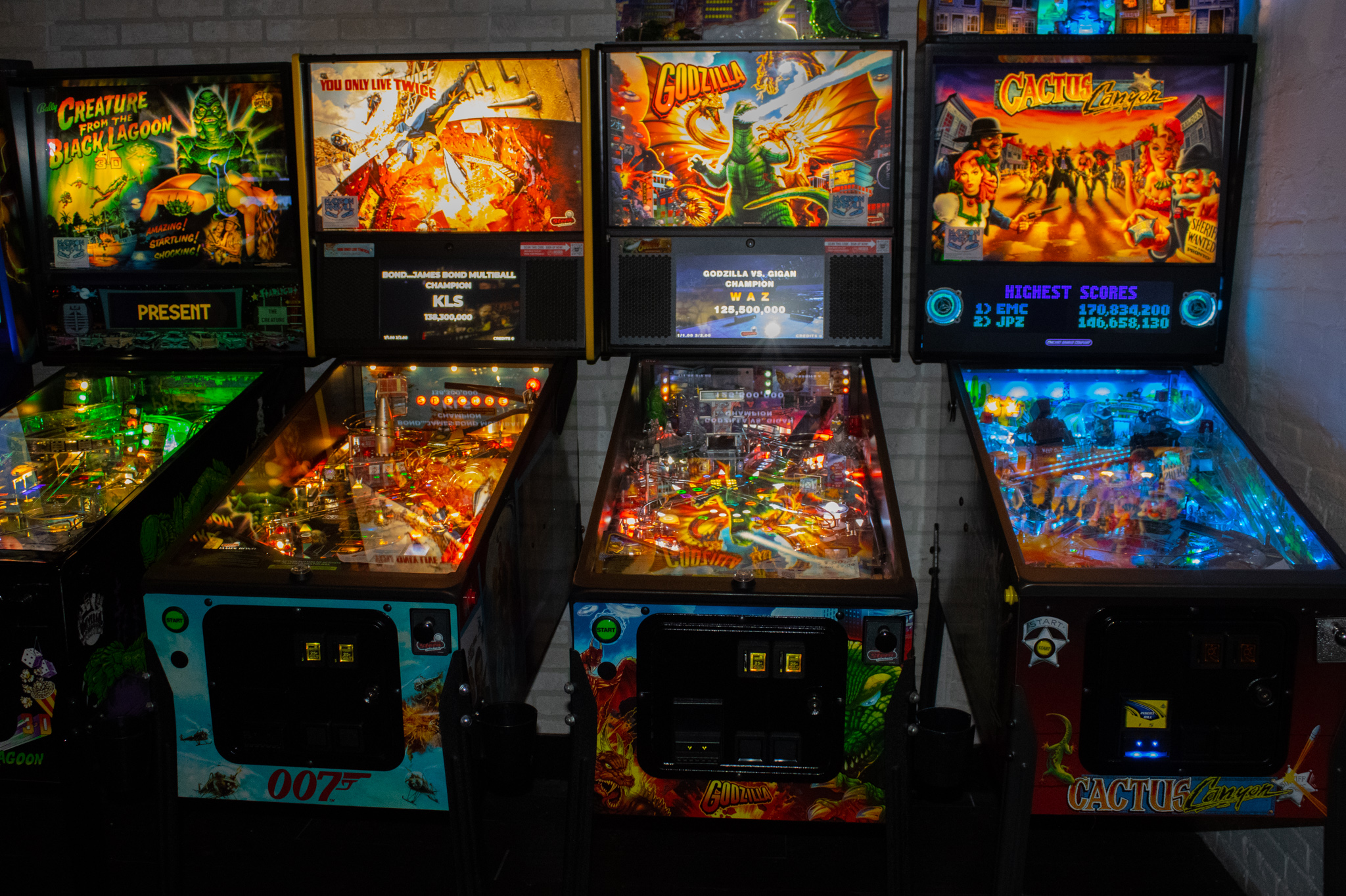 A row of pinball machines